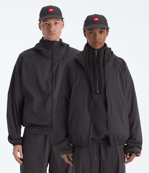 Mens-TNF-Red-Box-Packable-Hooded-Wind-Jacket-TNF-HERO.png
